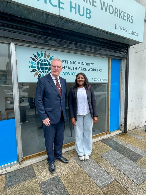 Health Minister Mike Nesbitt pictured outside the Ethnic Minority Healthcare Workers Hub in Ballyclare with manager Sharon.