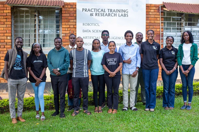 Wal-e Visual team with the Students from Uganda Christian University (Mukono) outside their Practical Training & Research Labs. 