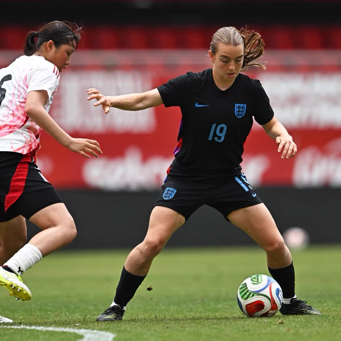 Denny Draper shields the ball during England Under-20s' win over Japan Under-20s.