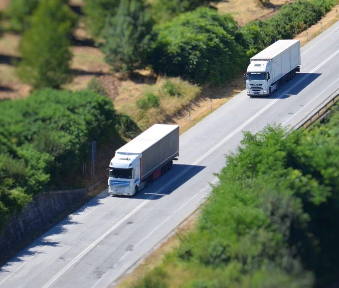 Kukla Customs Division visual for Multimodal 2026, featuring two lorries on a road to represent road freight, customs clearance and cross-border logistics. The post highlights the importance of asking the right questions early to support accurate documentation, compliance and the smooth movement of goods.