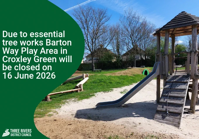 Image of an outdoor play area with a climbing frame and balance beams. In the background are large trees. Text that reads ‘Due to essential tree works Barton Way Play Area in Croxley Green will be closed on 16 June 2026’.