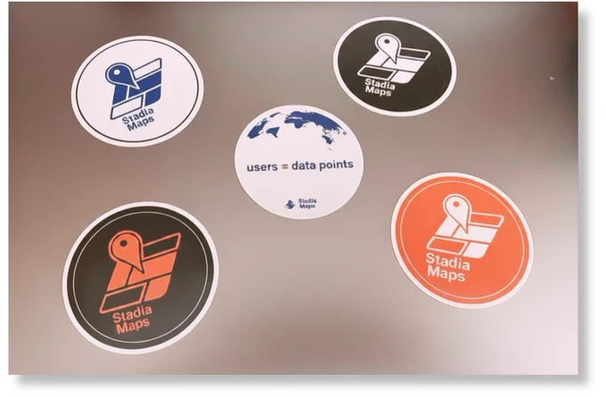 Photograph of five Stadia Maps stickers