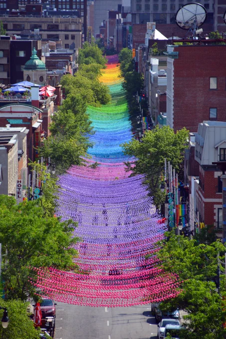Colouful Rainbow balls art installation "18 shades of gay" on Saint-Catherine Street in gay Village in 2017.