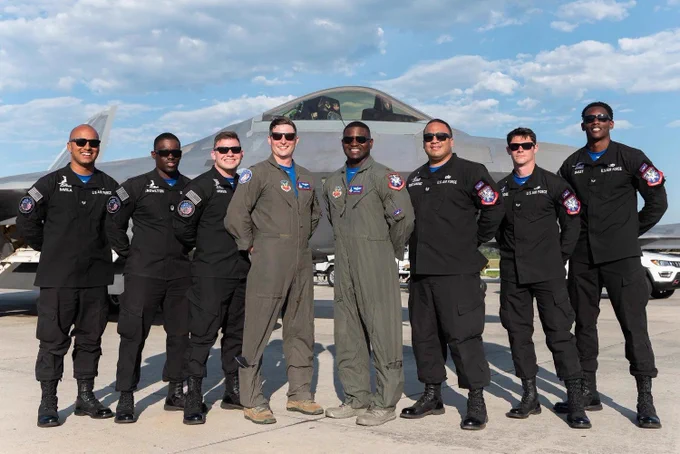 US Space Force flight suits, and some Air Force in the middle, I think?