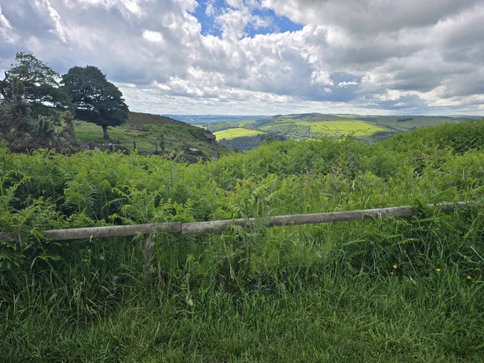 The post walk view from a bench, with hot chocolate and cake, in The Peak District 