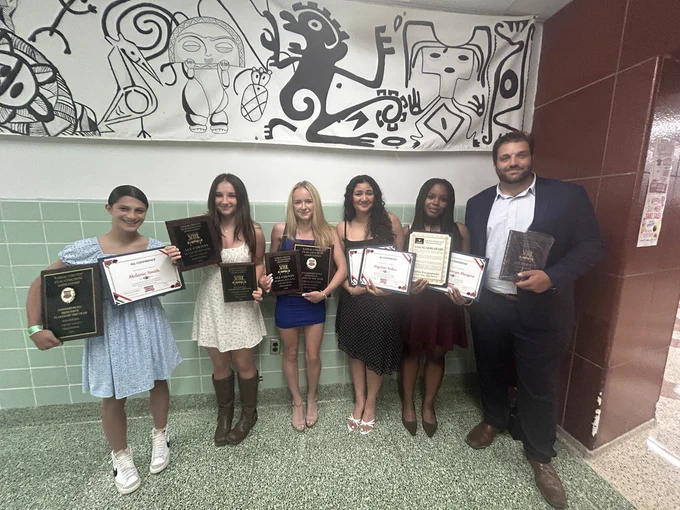 Varsity flag football players celebrate their awards at the close of the 2026 season.