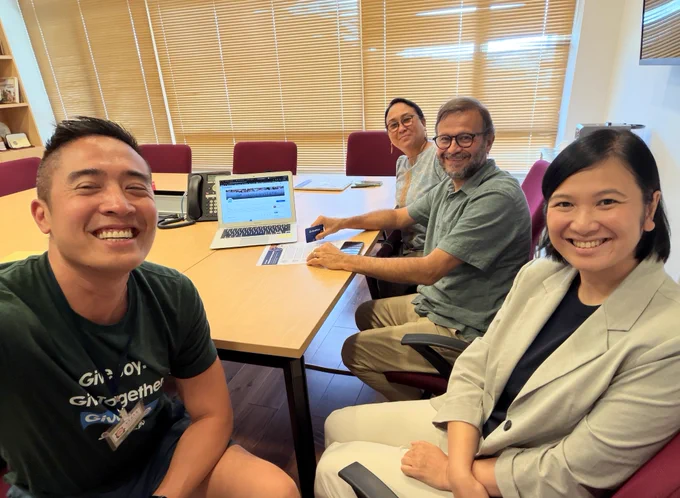 George Luc with colleagues, Teresa, Karen, and Vitor in Macau.