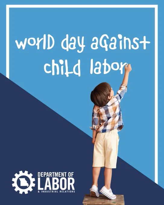Young boy standing on a stool writing 'World Day Against Child Labor' on a blue wall with Department of Labor logo below.