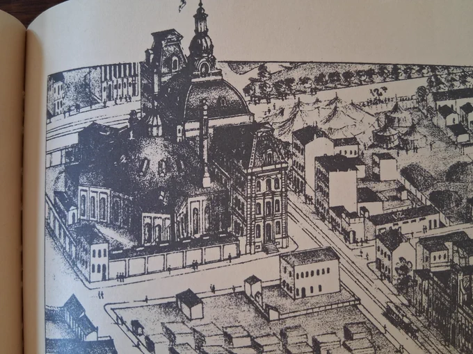 A photo of a black and white book illustration. 