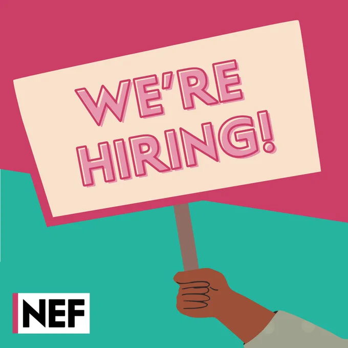Hand holding a placard that says we're hiring!