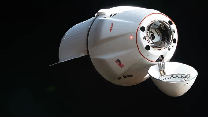 The SpaceX Dragon cargo spacecraft supporting the company’s 34th commercial resupply services mission for NASA approaches the International Space Station on May 17, 2026, carrying nearly 6,500 pounds of food, supplies, and equipment for the Expedition 74 crew.