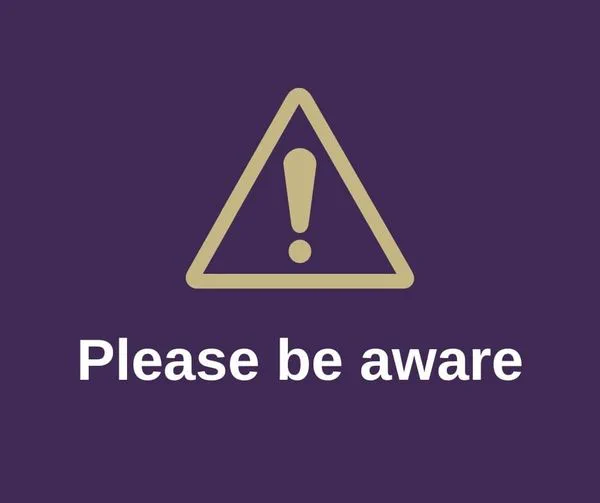 An alert symbol with the text Please Be Aware