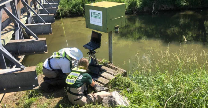 USGS hydrologic technicians log data at Gunpowder Falls at Glencoe, Maryland.