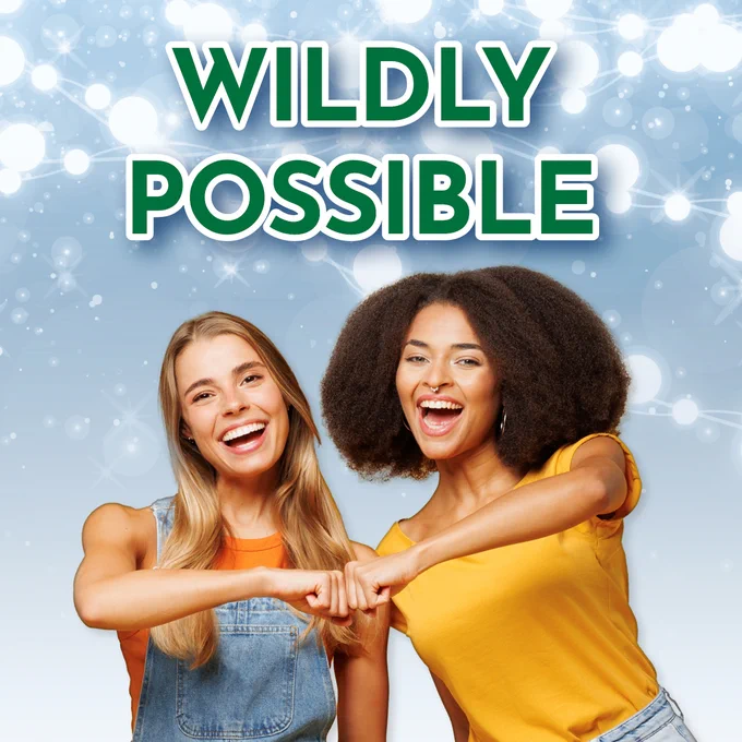 Two people smiling and bumping fists in front of a background with abstract light patterns. The text "Wildly Possible" is displayed above them.
