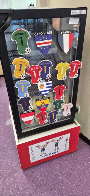 St Francis Primary fridge display of strips and flags of nations participating in the 2026 World Cup as part of the World Cup theme day 