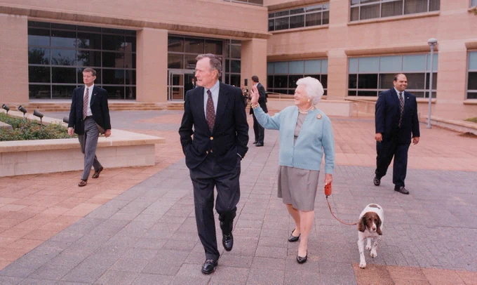 George HW Bush. Barbara Bush, and their dog.