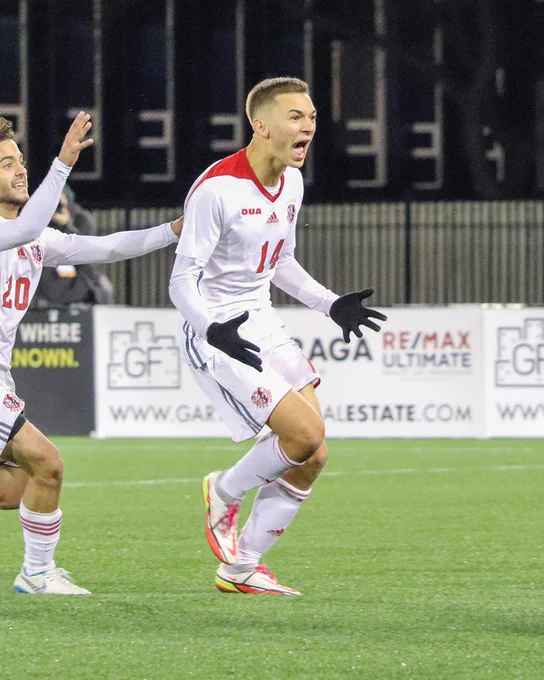 Photo of former York soccer player celebrating a goal 