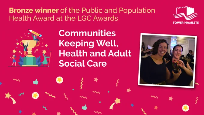Two women smile holding a bronze award, celebrating a win for 'Communities Keeping Well, Health and Adult Social Care'.