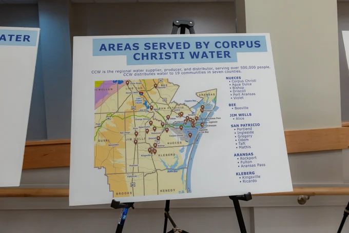 A posterboard with a map showing the areas served by Corpus Christi Water which includes some cities in Nueces, Bee, Jim Wells, San Patricio, Aransas, and Kleberg counties.