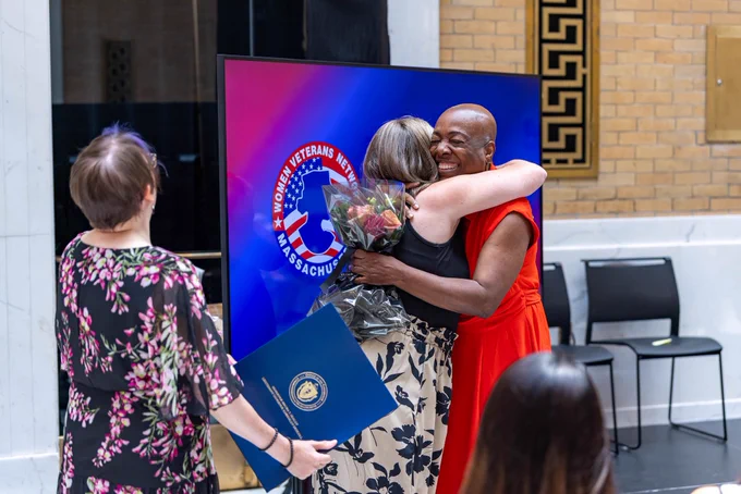 Two woman hugging