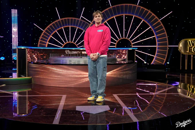 A photo of Kiké Hernández posing on set in front of home plate.