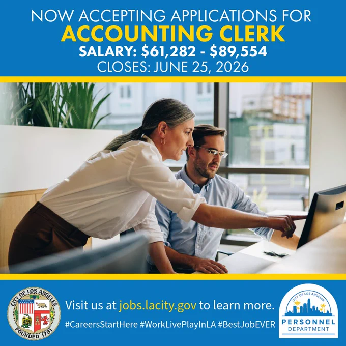 Colleagues working together on a computer, discussing  work in a modern office. The City of Los Angeles is promoting an Accounting Clerk job opportunity, including salary and deadline details.
