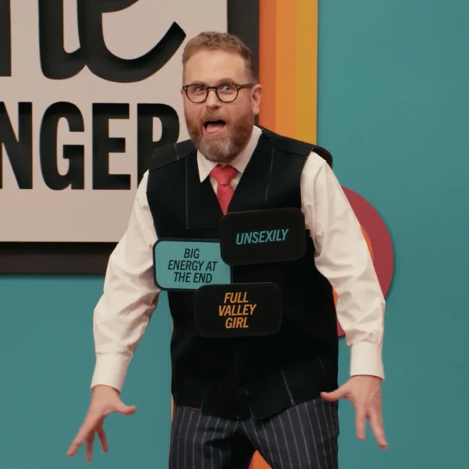 Sam Reich from 'Rulette' wearing rules: Big Energy at the End, Unsexily, and Full Valley Girl. Then Sam Reich in 'Rulette 2' wearing the rules: In a Vaguely European Accent, Loquaciously, Curtsy to Speakers, End With Cool Move, Say "Cooties!" Upon Any Touch, As a Sycophantic LLM, and End with Non-Famous Full Name.