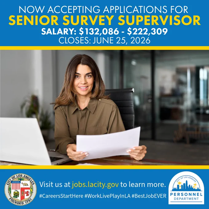 Professional woman reviewing documents at desk with laptop. The City of Los Angeles is promoting a Senior Survey Supervisor job opportunity, including  salary and deadline details.