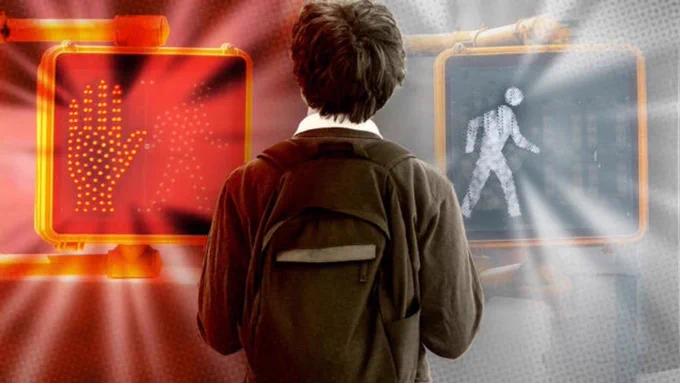 A photo illustration of a student standing in the middle of the frame wearing a backpack, the left side of the frame has a glowing red "don't walk" pedestrian crossing hand illuminated and the right side of the frame has the "walk" figure illuminated with bright white light.