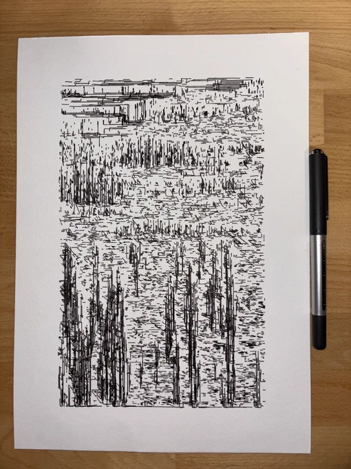 Black ink abstract line drawing on white paper, resembling vertical bars and horizontal patterns, placed on a wooden surface