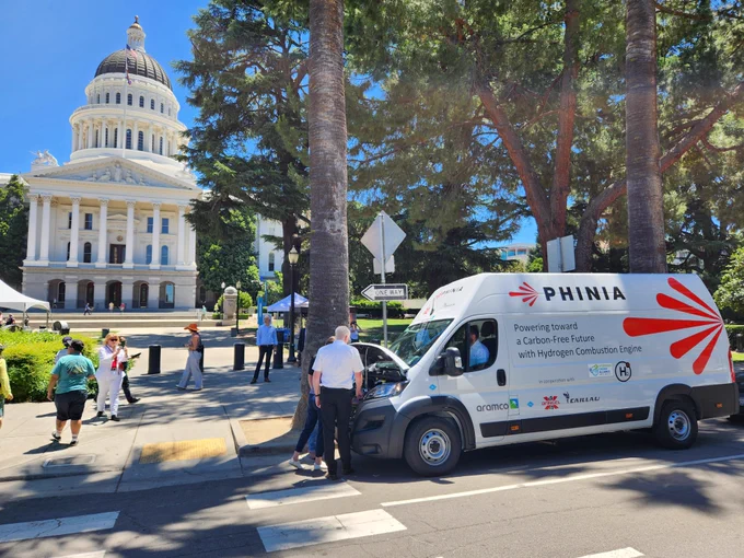 The demonstration vehicle with the State Capitol in the background