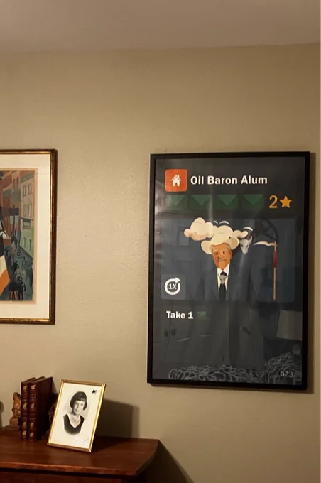 Framed copy of a poster-sized version of the Oil Baron Alum card from Envelopes of Cash.