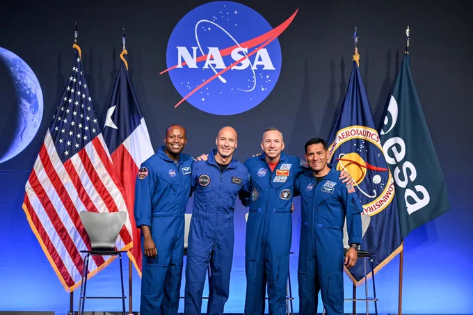 NASA astronaut Andre Douglas, ESA (European Space Agency) astronaut Luca Parmitano, and NASA astronauts Randy Bresnik and Frank Rubio take a photo together on June 9, 2026 following the Artemis III crew announcement in Houston. Credit: NASA/Robert Markowitz