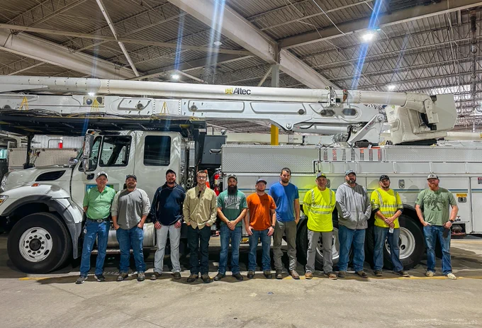 Lineworkers and tree trimmers preparing for deployment to support another community