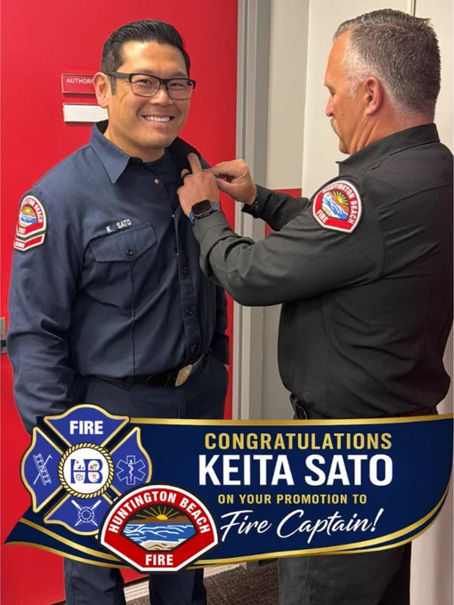 Huntington Beach Fire Chief Jeff McCoy pins the Fire Captain badge on Keita Sato during a promotion ceremony. Captain Sato smiles while standing in front of a red door, as a congratulatory graphic featuring Huntington Beach Fire Department logos and the message "Congratulations Keita Sato on Your Promotion to Fire Captain" is displayed across the bottom of the image.