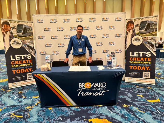 Photos from the 2026 Broward & Beyond Business Conference show attendees networking, visiting exhibitor booths, participating in panel discussions, and posing for group photos. Images include a BCT recruitment and outreach booth, conference speakers on stage, audience engagement, and business professionals connecting throughout the event. The conference took place in a large convention venue and focused on economic development, business growth, and community partnerships in Broward County.