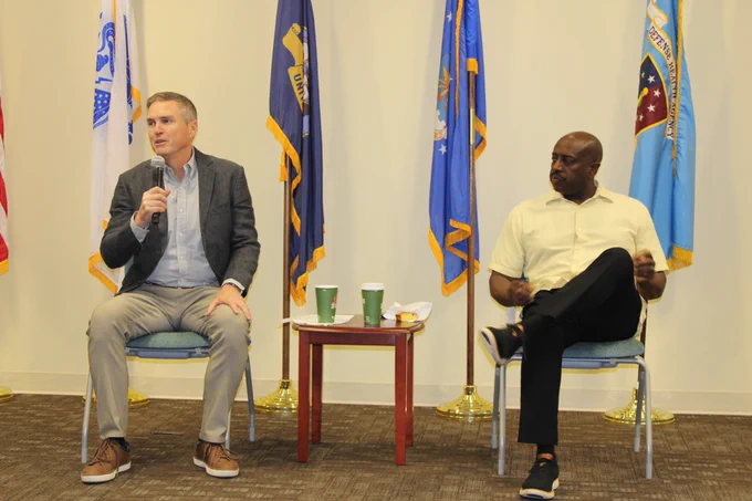 AFHSD's Division Chief, Capt. Richard Langton and Deputy Chief Capt. Carlos Williams speak to staff during a Coffee with the Captains event.