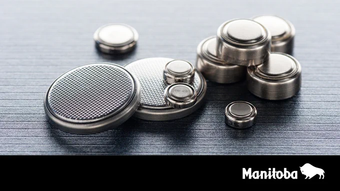 Photo of several small round button batteries of different sizes.