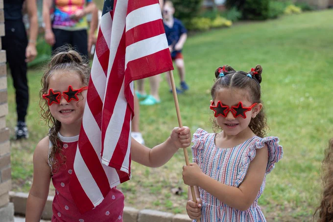 students and staff celebrating flag day