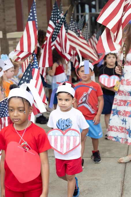 students and staff celebrating flag day