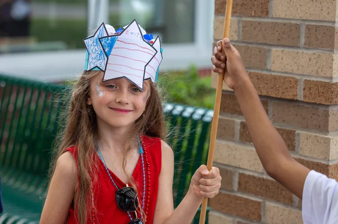students and staff celebrating flag day