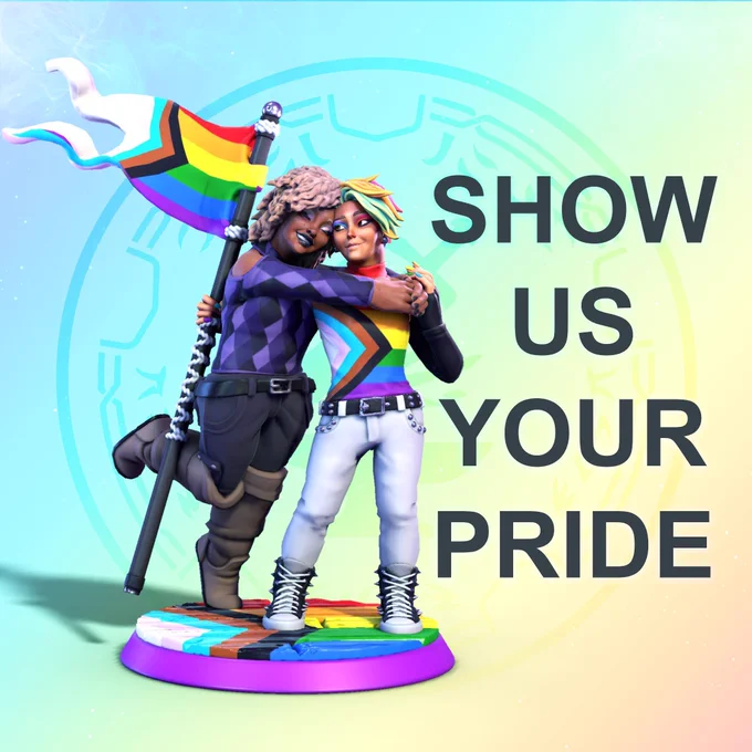 An image featuring two people against a rainbow background in  clothes representing the pride flag. One of these people is also proudly holding up a pride flag.
