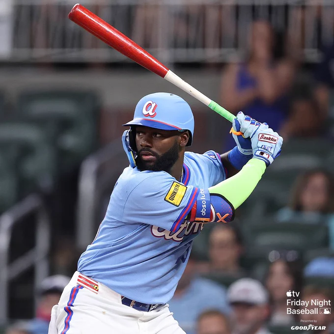 Michael Harris II prepares to swing. He is wearing a light blue Atlanta Braves City Connect jersey and a light blue Braves City Connect batting helmet. 