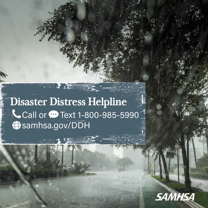 AMHSA's Disaster Distress Helpline with contact information, displayed over an image of a hurricane