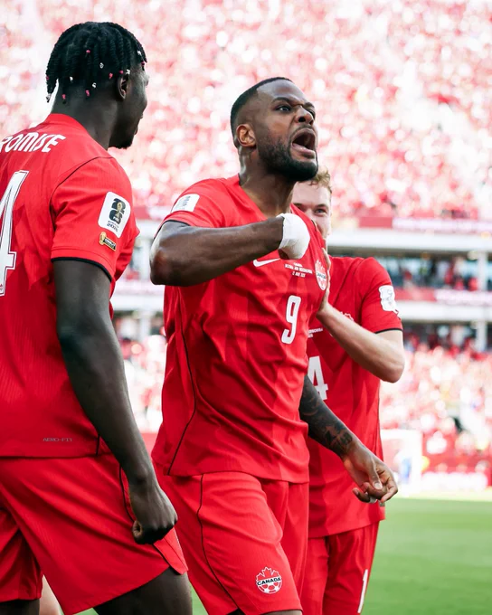 Cyle Larin celebrates scoring for Canada against Bosnia in the World Cup