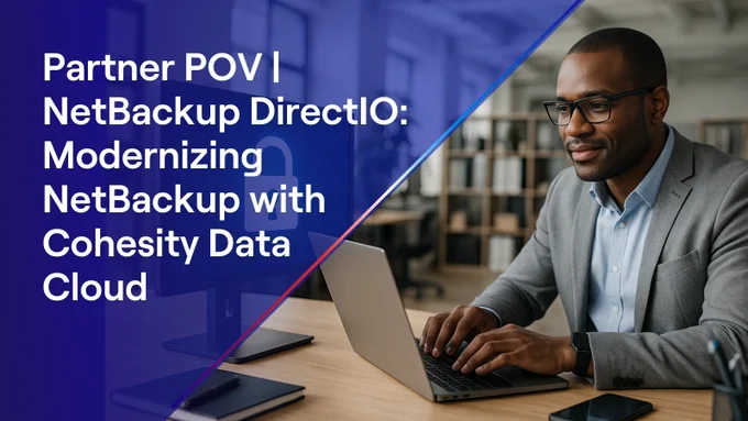 A man in glasses and a grey suit typing on a laptop. Text on the left reads \"Partner POV I NetBackup DirectIO: Modernizing NetBackup with Cohesity Data Cloud.\"