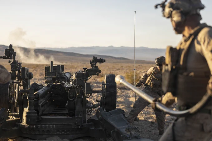 U.S. Marines assigned to Battalion Landing Team 2/4, 13th Marine Expeditionary Unit, fire an M777 howitzer in support of a fire mission during unit-level training at Marine Corps Air Ground Combat Center Twentynine Palms, California, May 31, 2026. Unit-level training allows the artillery battery to hone fundamental skills and fire-direction procedures, forging a lethal and cohesive team prepared to provide critical fire support for the 13th MEU during complex and austere operations. (U.S. Marine Corps photo by Sgt. Mary R. Jenni)\n\n
