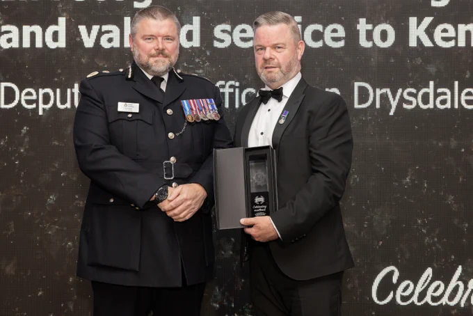 Photograph is of Chief Constable Tim Smith and former Deputy Chief Officer Ian Drysdale at a previous awards ceremony.