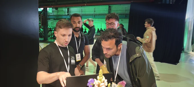 Kiril Peyanski showing a demo to people at the Progress booth at React Summit