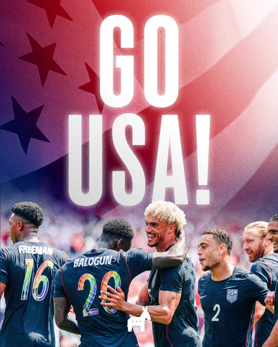 A graphic supporting the United States Men's National Soccer Team featuring the bold text "GO USA!" set against a backdrop of the American flag. Below the text, players including Balogun and Freeman celebrate on the pitch in dark jerseys featuring rainbow-colored numbers.